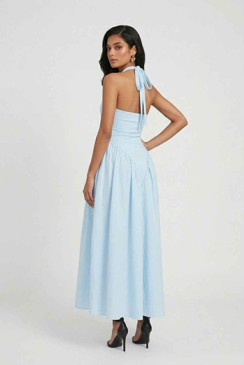 Light blue Sophia midi dress by Lumina Wear, featuring an elegant fit and soft fabric, perfect for stylish occasions.