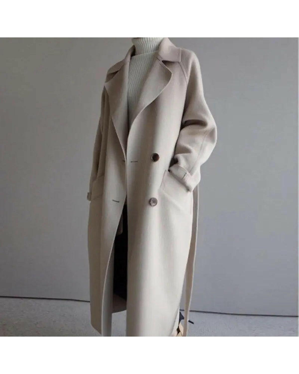 Beige Sophie long coat for women by Lumina Wear, featuring a stylish, elegant design with a tailored fit.