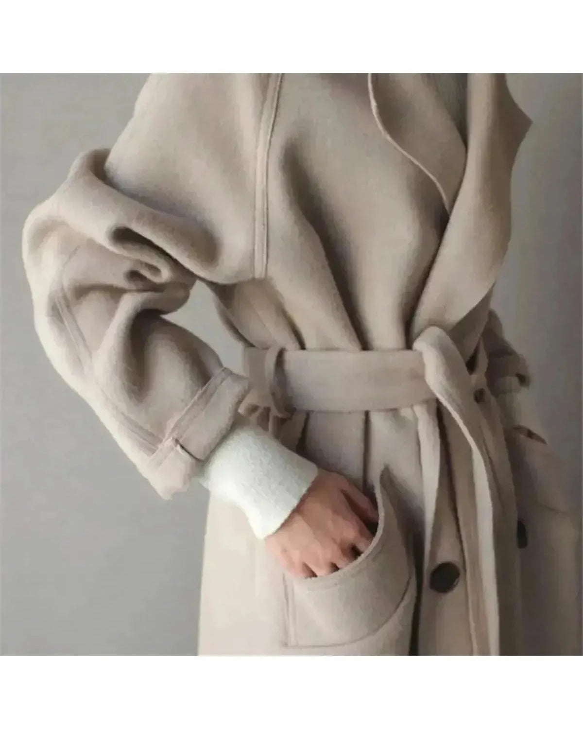 Beige Sophie long coat for women by Lumina Wear, featuring a stylish and elegant design perfect for cold weather.