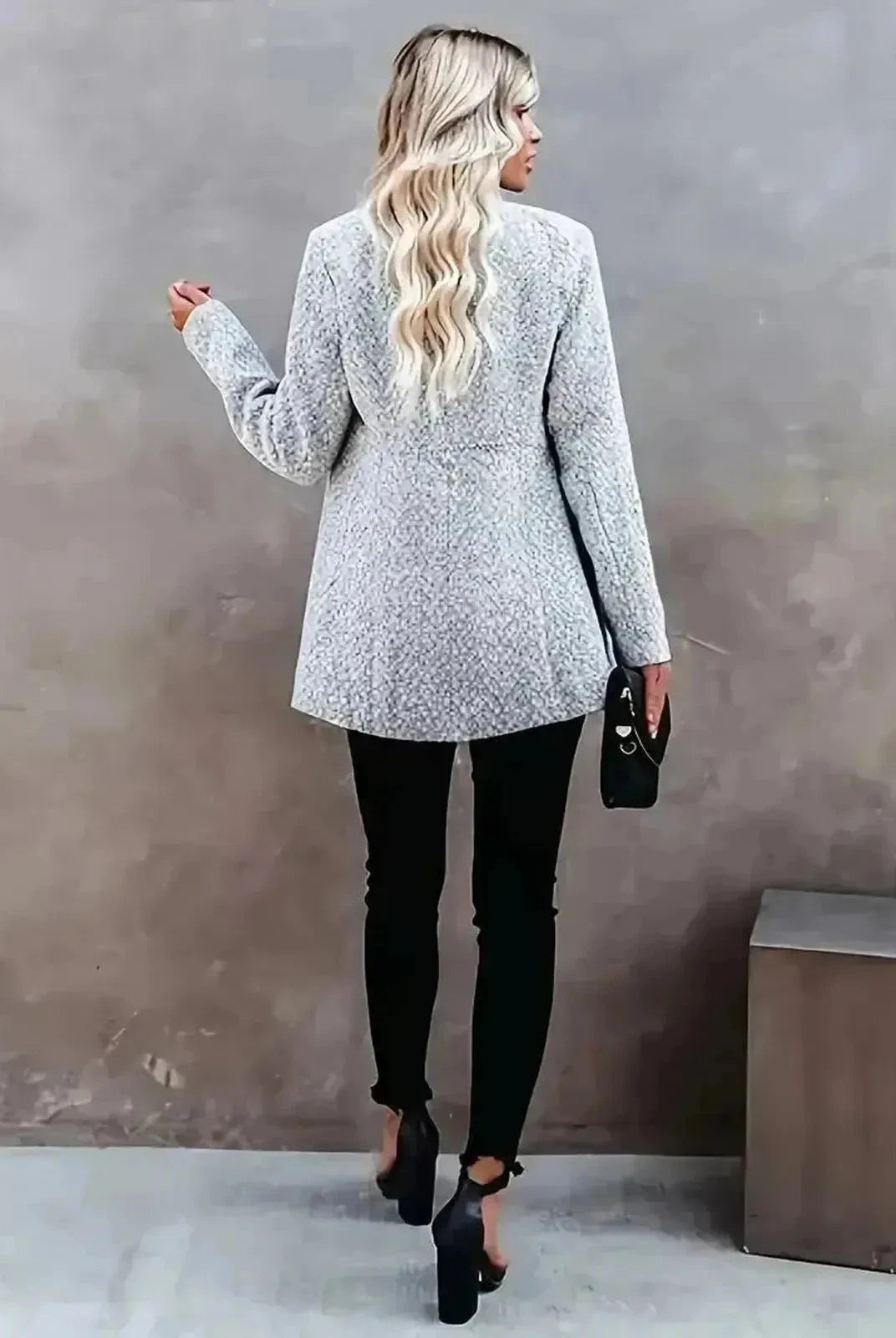 Light grey Stella mid-length coat with pockets by Lumina Vancouver, showcasing its elegant design and tailored fit.