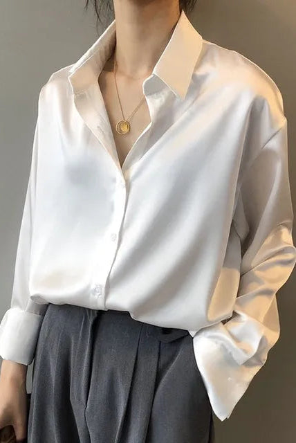 Green satin blouse by Lumina Wear featuring a classic button-down design, elegant style, and tailored fit.