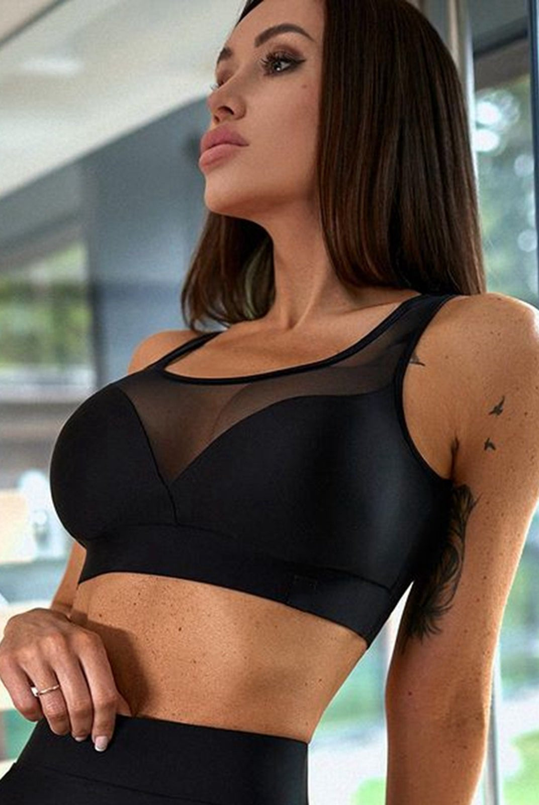 Black mesh hip-lift leggings by Lumina Vancouver featuring a sexy, unique design and comfortable fit.