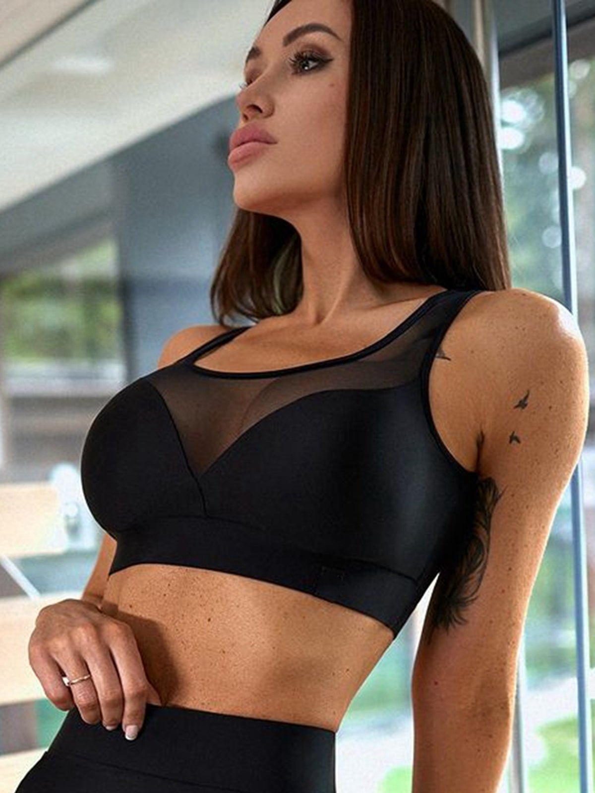 Black mesh hip-lift leggings by Lumina Vancouver featuring a sexy, unique design and comfortable fit.