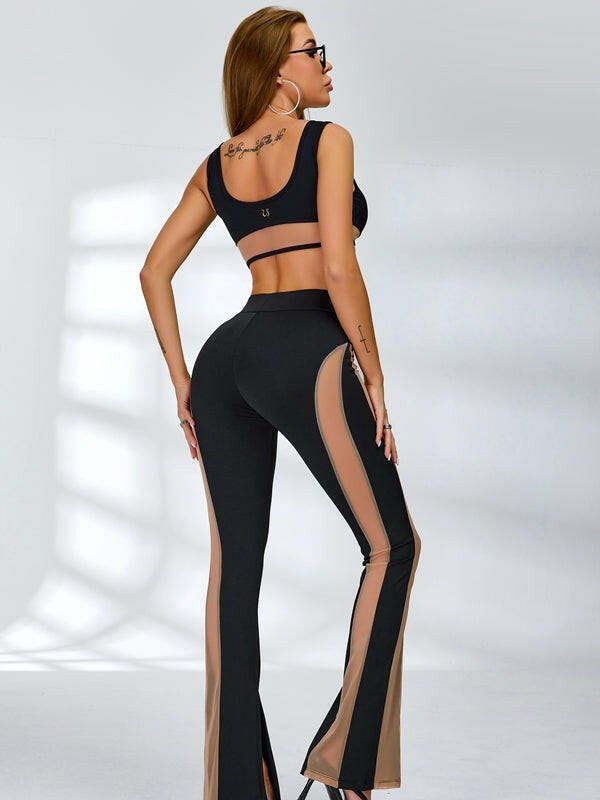 Black Lumina Vancouver sheer mesh sports bra with a unique, sexy design, ideal for active wear and stylish workouts.