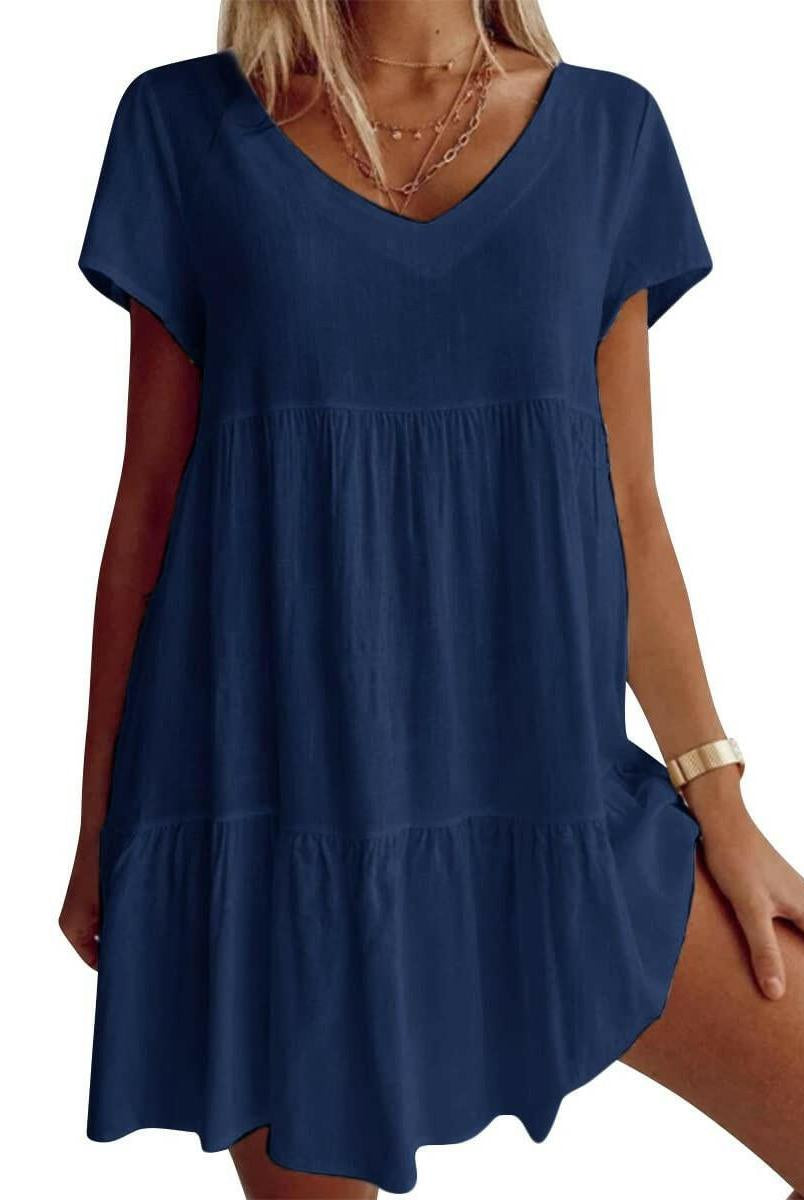 White Suzy Breezy V-Neck Dress by Lumina Vancouver, lightweight and flowy, perfect for warm weather and casual occasions.