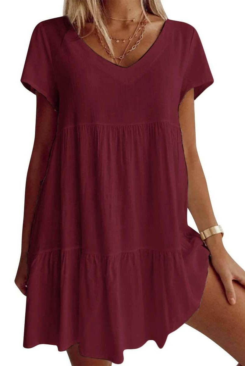 White Suzy Breezy V-Neck Dress by Lumina Vancouver, lightweight fabric, styled for casual summer wear.