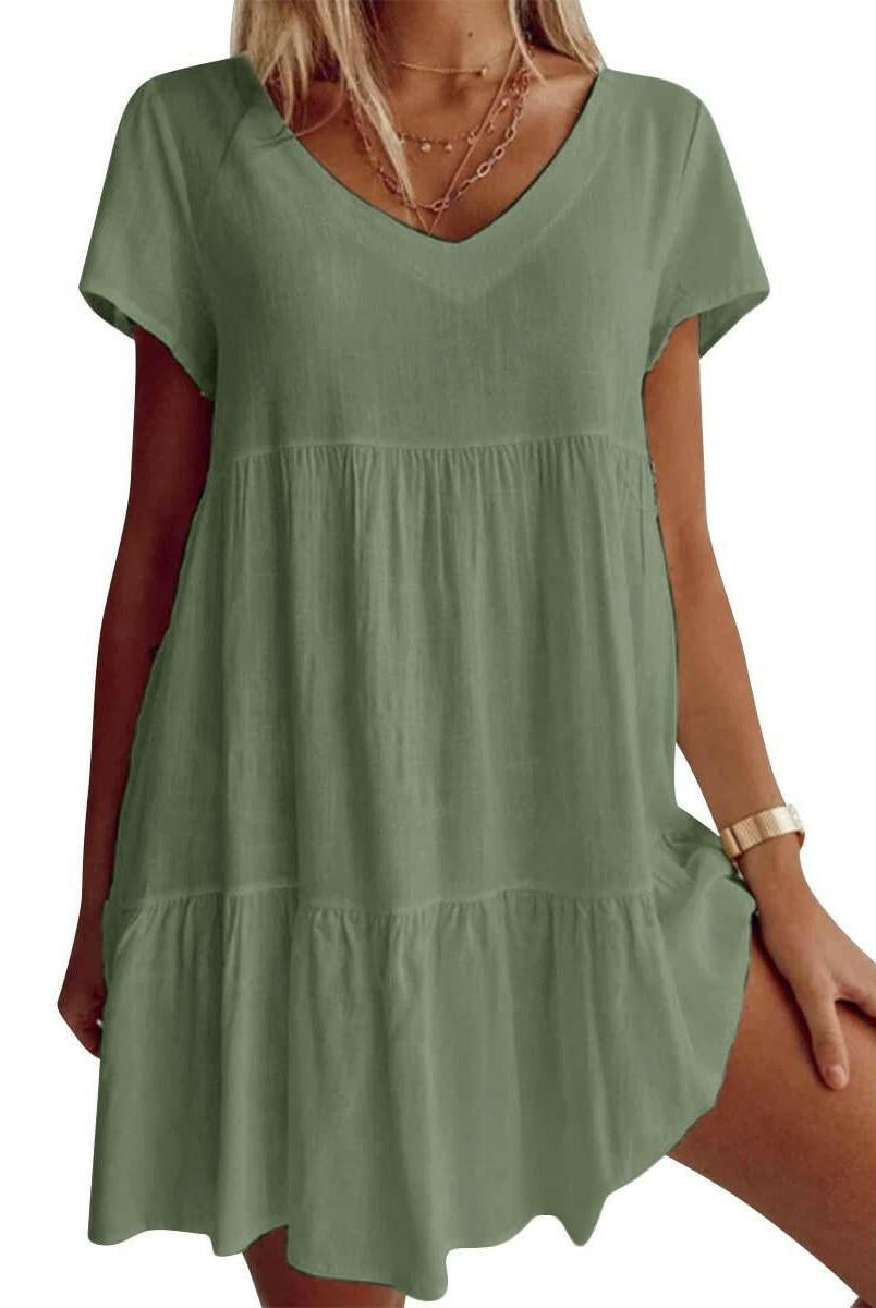 White Suzy Breezy V-Neck Dress by Lumina Vancouver, lightweight and stylish for warm weather, shown on a model.