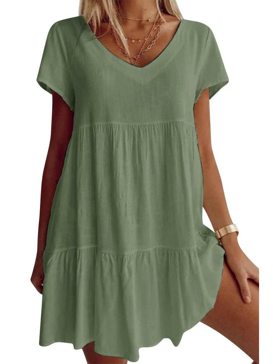 White Suzy Breezy V-Neck Dress by Lumina Vancouver, lightweight and stylish for warm weather, shown on a model.