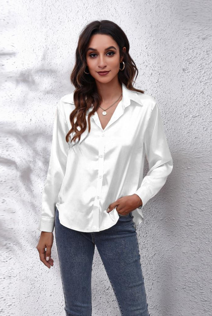Light blue Lumina Women's Satin Blouse with relaxed fit and timeless design, showcased on a model.