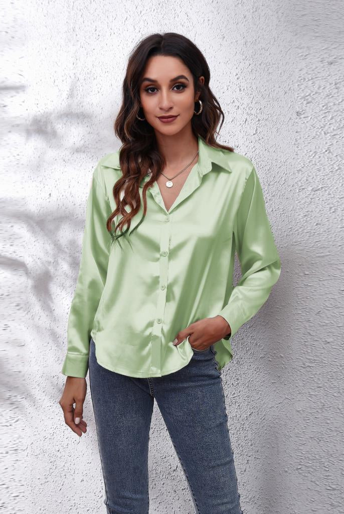 Blue Sydney relaxed fit satin blouse by Lumina Wear, showcasing smooth fabric and elegant design for women's blouses.