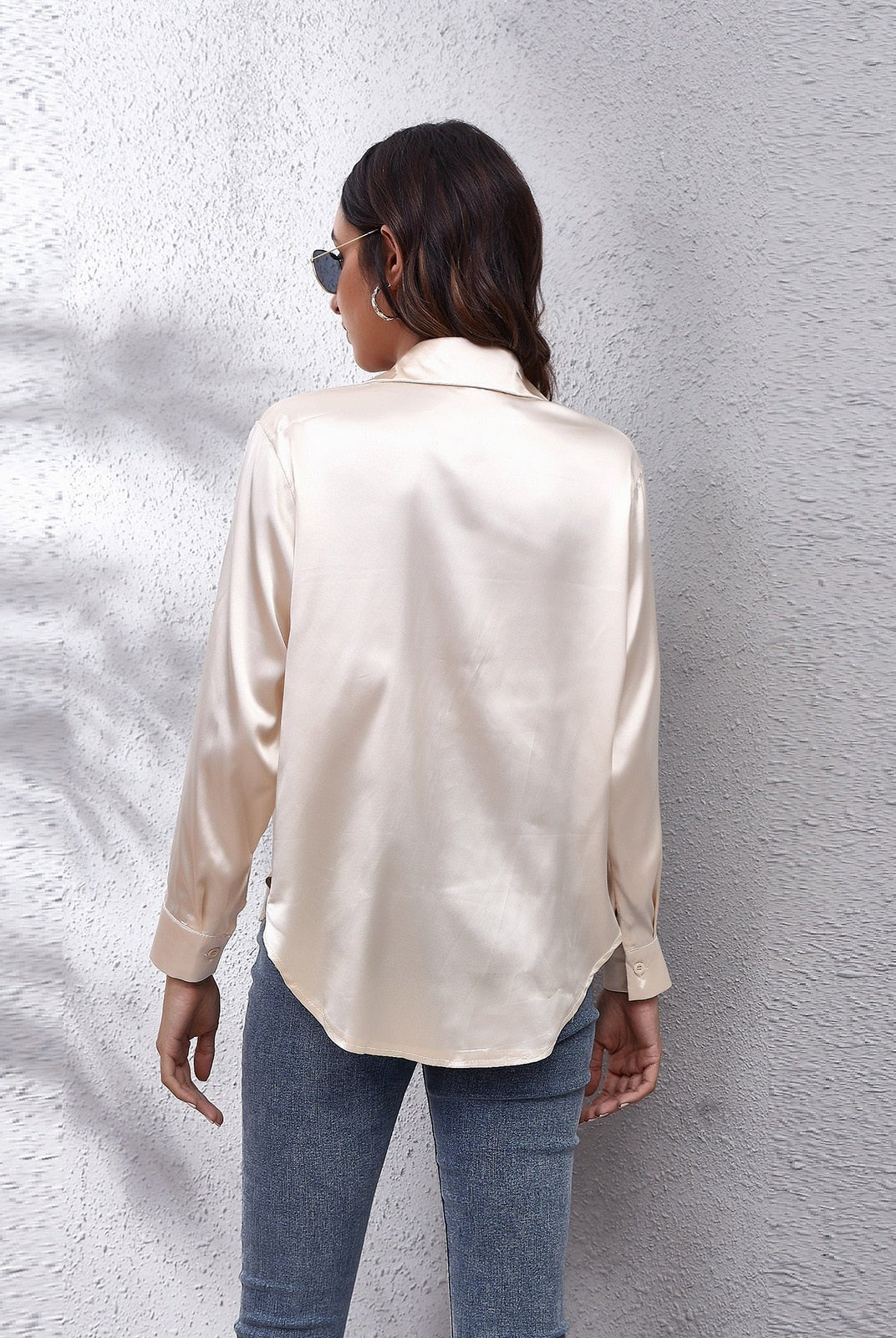 Light blue Lumina Wear Sydney relaxed fit satin blouse for women, showcasing smooth fabric and timeless design.