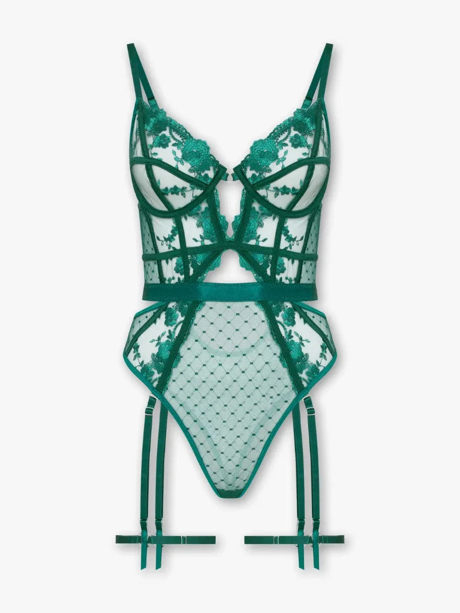 Lumina Vancouver Sylvie Bodysuit in sleek fabric, featuring a fitted design and scoop neckline, displayed on a neutral background.