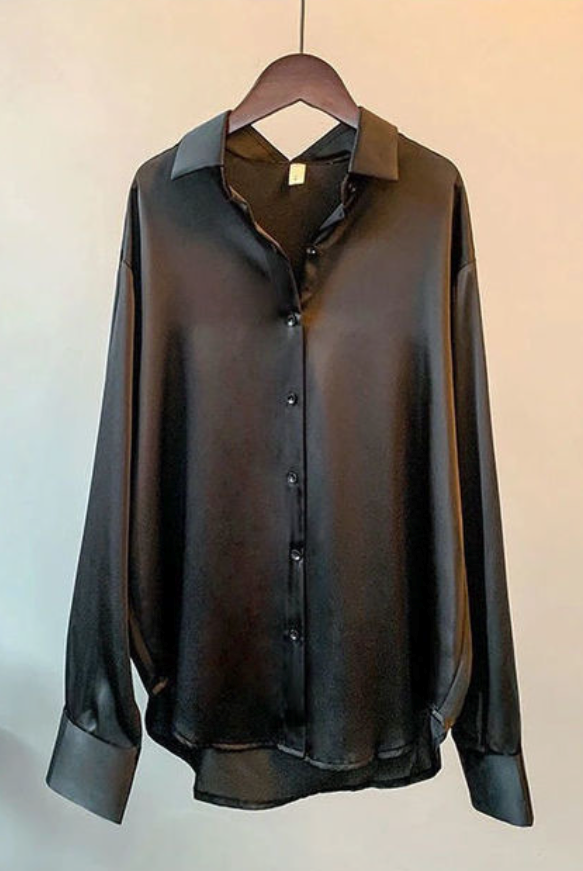 Beige Taylor Lumina Wear relaxed fit blouse with button details, shown on a model, casual and elegant style.