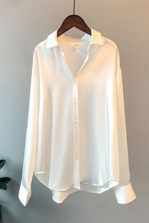 Beige Taylor Lumina relaxed fit blouse with button details, featuring a stylish and comfortable design for casual and office wear.