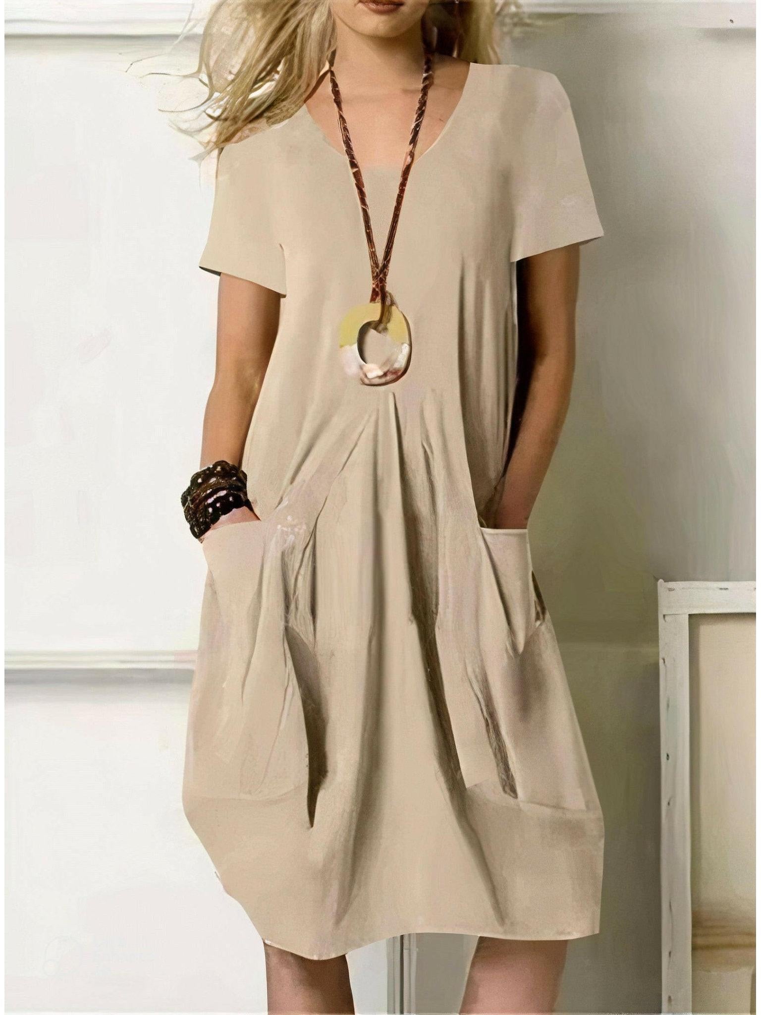Orange UBUD™ casual dress by Lumina Vancouver, lightweight and stylish for everyday wear, shown on a model.