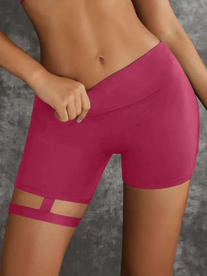 Dark sea green Lumina Vancouver sports bras with unique cut-out design, shown in a bundle, made for activewear and comfort.