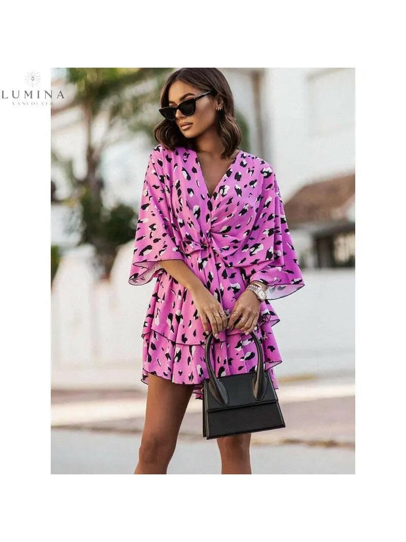 Lumina Vancouver Valeria bohemian floral mini summer dress in orange and pink, featuring a relaxed fit and lightweight fabric.