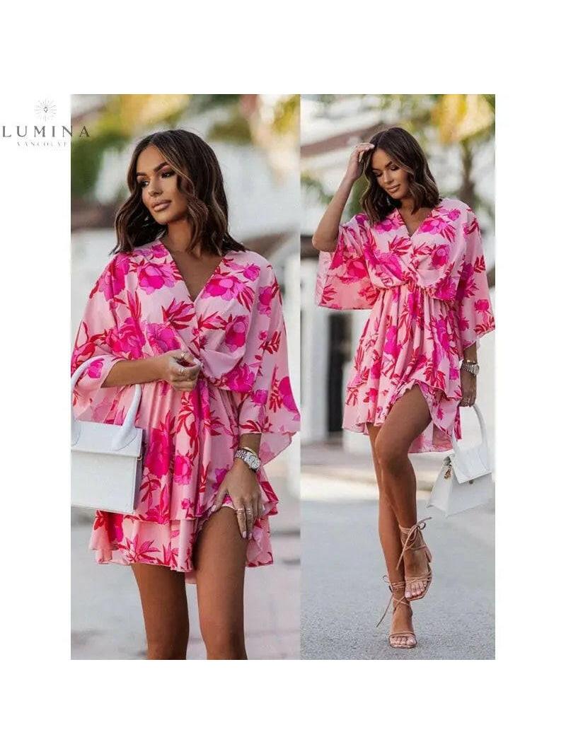 Lumina Vancouver Valeria bohemian floral mini summer dress in orange and pink, size S-8/10, with a flowy, casual style.