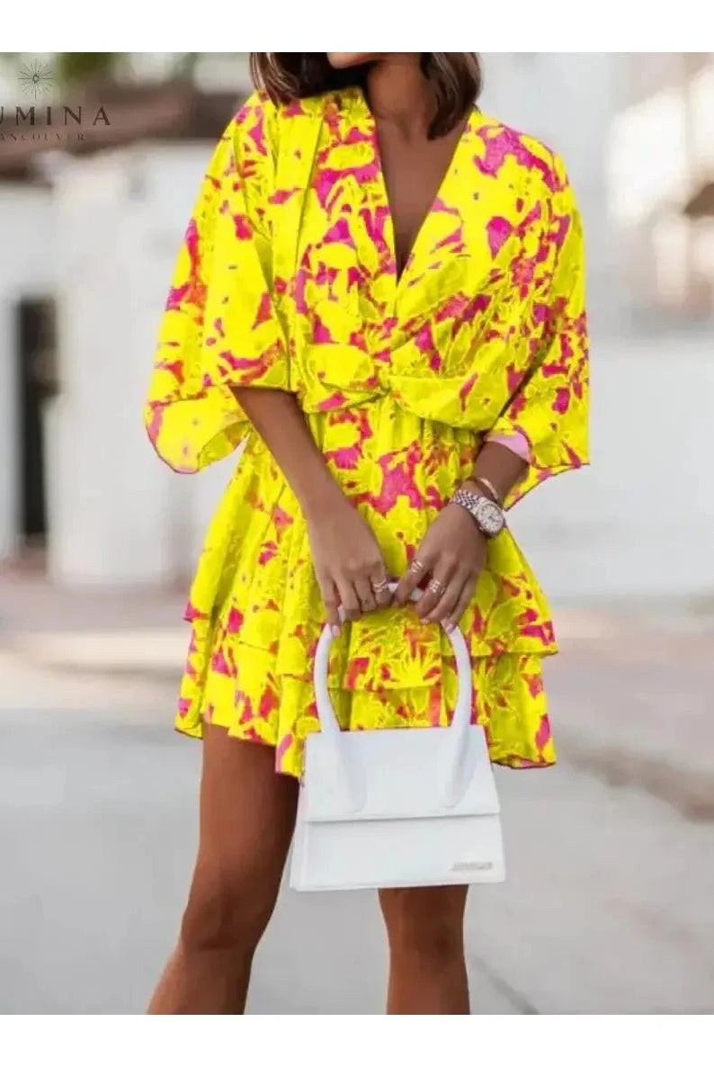 Valeria Bohemian Floral Mini Dress by Lumina Vancouver featuring orange and pink floral patterns, sleeveless summer dress for women.