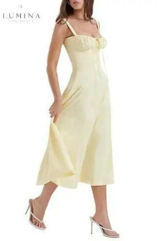 White Venura spring evening dress with floral print by Lumina Wear, perfect for wedding guests and spring occasions.