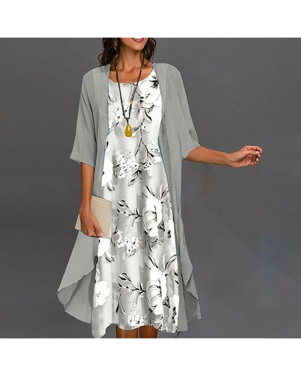 Elegant printed dress from Lumina Wear featuring a stylish design, perfect for any occasion, shown in the Viane dress image.
