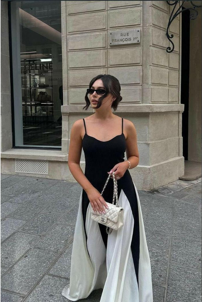 Black and white Viara paneled maxi dress by Lumina Wear, flowing fabric with a stylish, elegant silhouette.