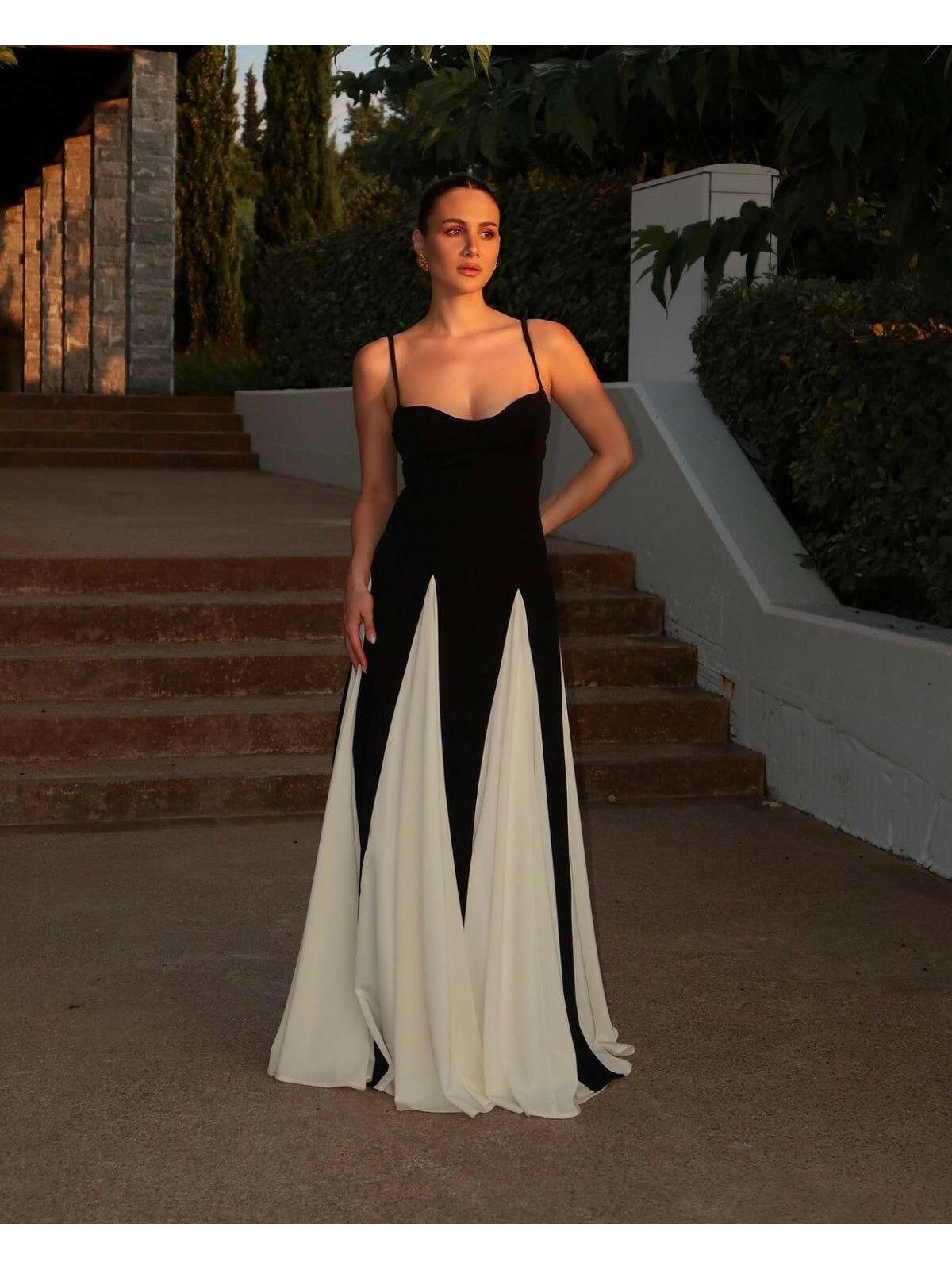 Black and white Viara paneled maxi dress by Lumina Vancouver, featuring a flowing silhouette and stylish design.