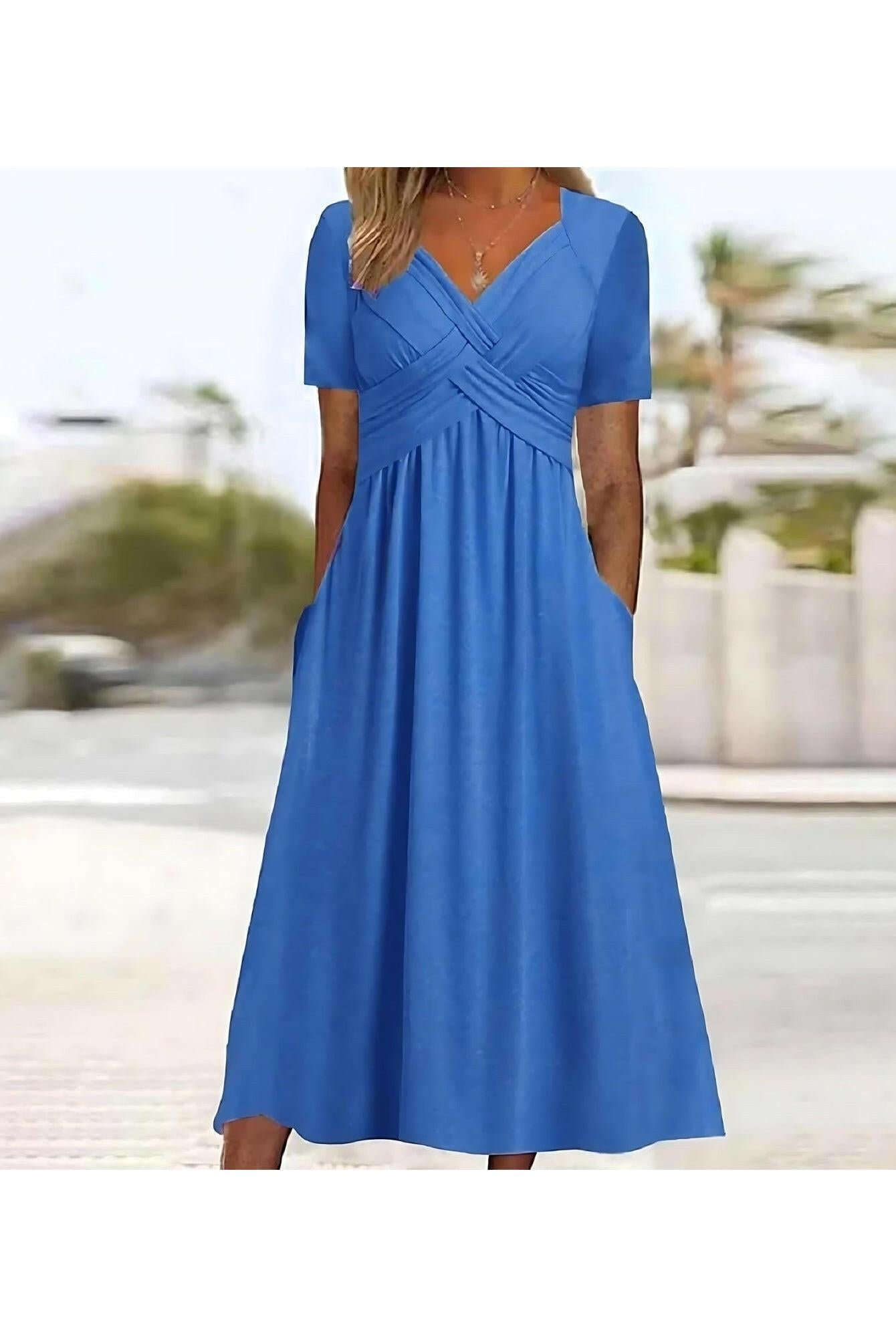 Vicky™ casual elegance midi dress in green by Lumina Vancouver, featuring a relaxed fit and stylish design.