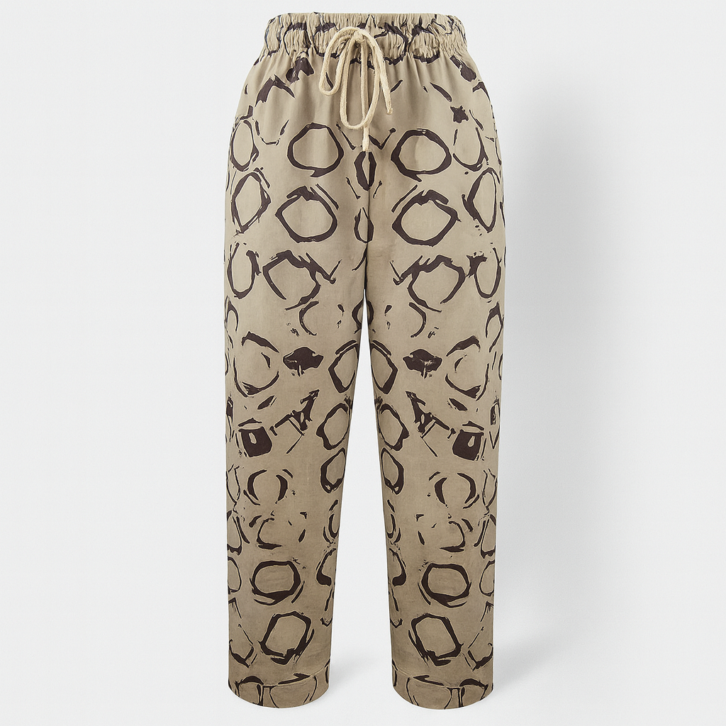 Lumina Wear Victor beige relaxed trousers with elastic waistband and circle print, casual pants for comfortable everyday wear.