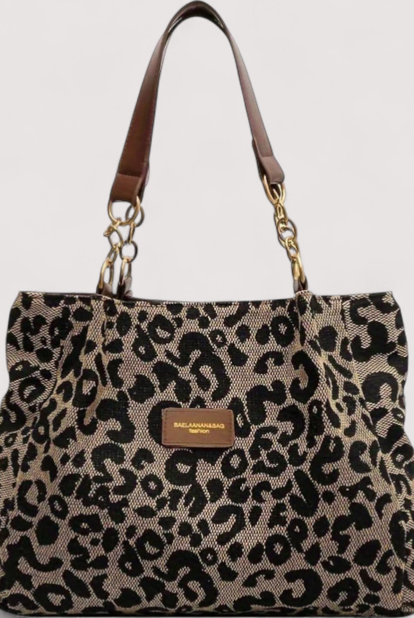 Victoria bold leopard print canvas shopping bag by Lumina Wear, featuring a spacious design and durable handles.
