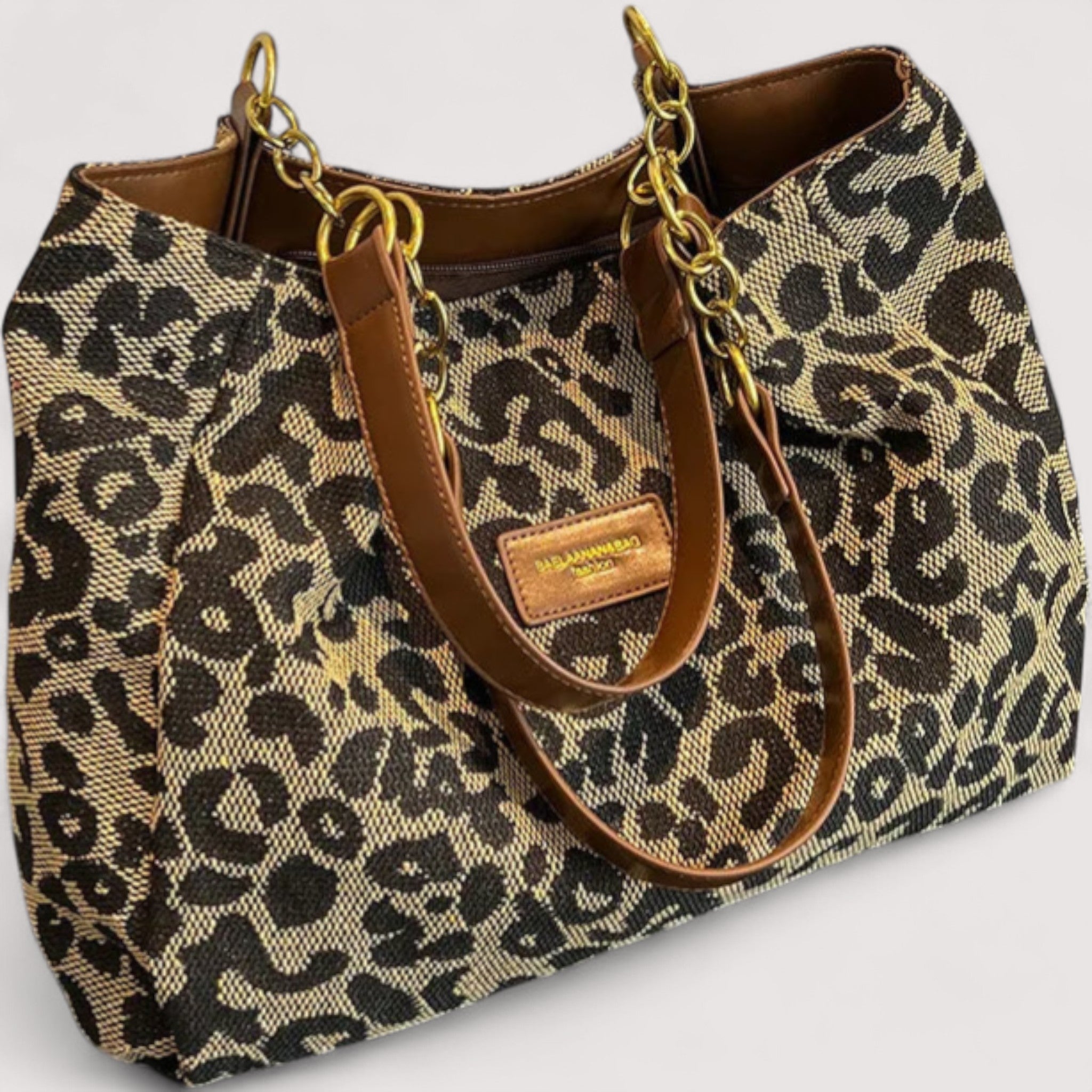 Victoria bold leopard print canvas shopping bag by Lumina Wear, stylish and spacious handbag with a vibrant animal pattern.