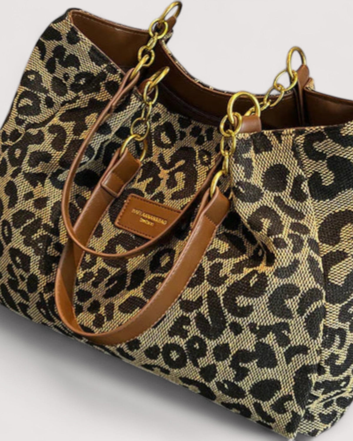 Lumina Wear Victoria leopard print canvas shopping bag with sturdy handles, stylish and spacious for everyday use.