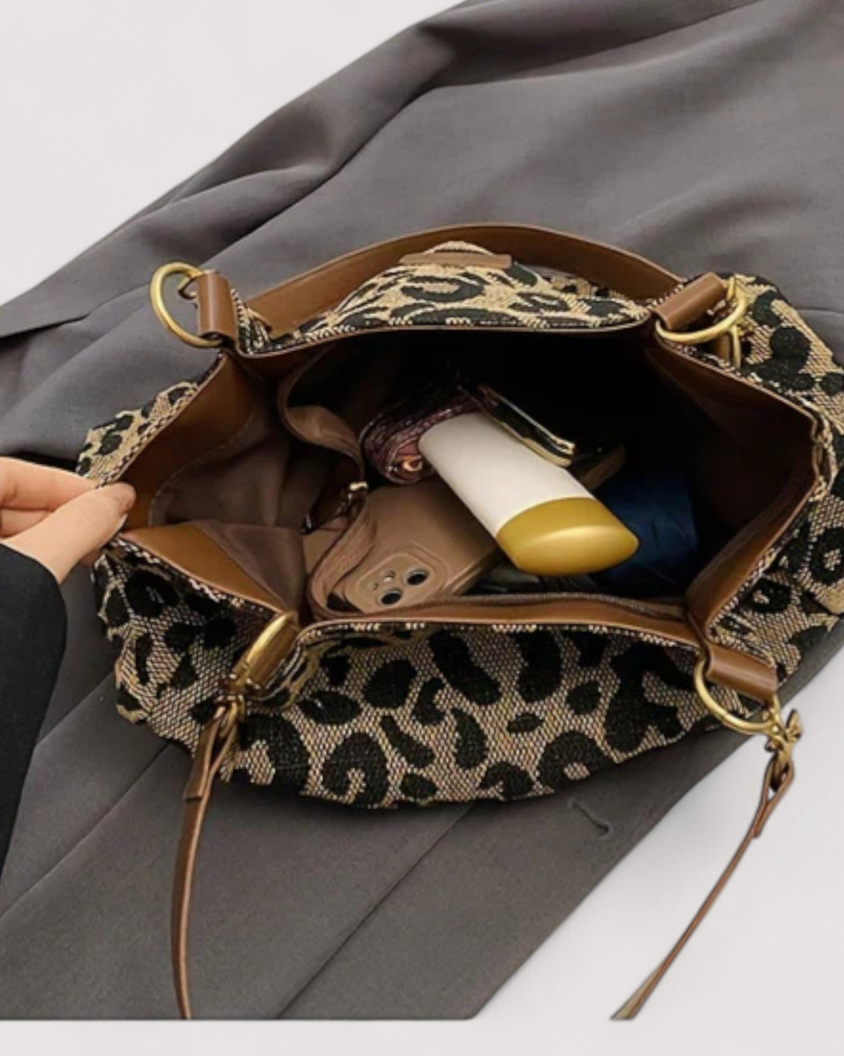 Victoria Lumina Leopard Print Canvas Shopping Bag, stylish handbag with bold leopard pattern, soft handles, and spacious interior.