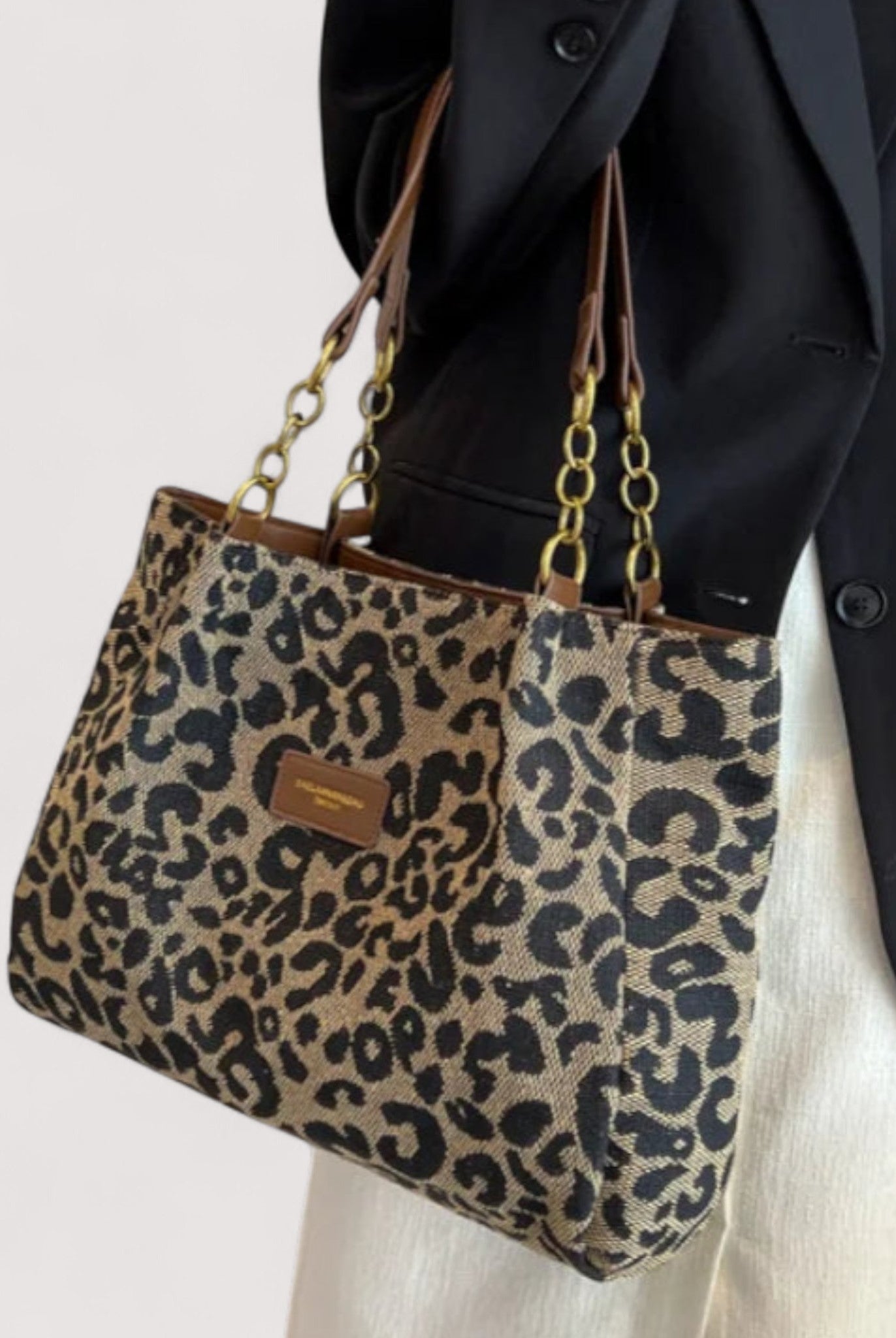 Victoria bold leopard print canvas shopping bag by Lumina Wear, featuring spacious design and sturdy handles.