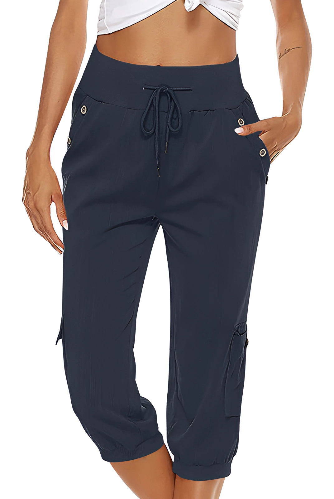 Women's breathable green capri trousers with elastic waist by Lumina Wear, featuring a comfortable fit and stylish design.