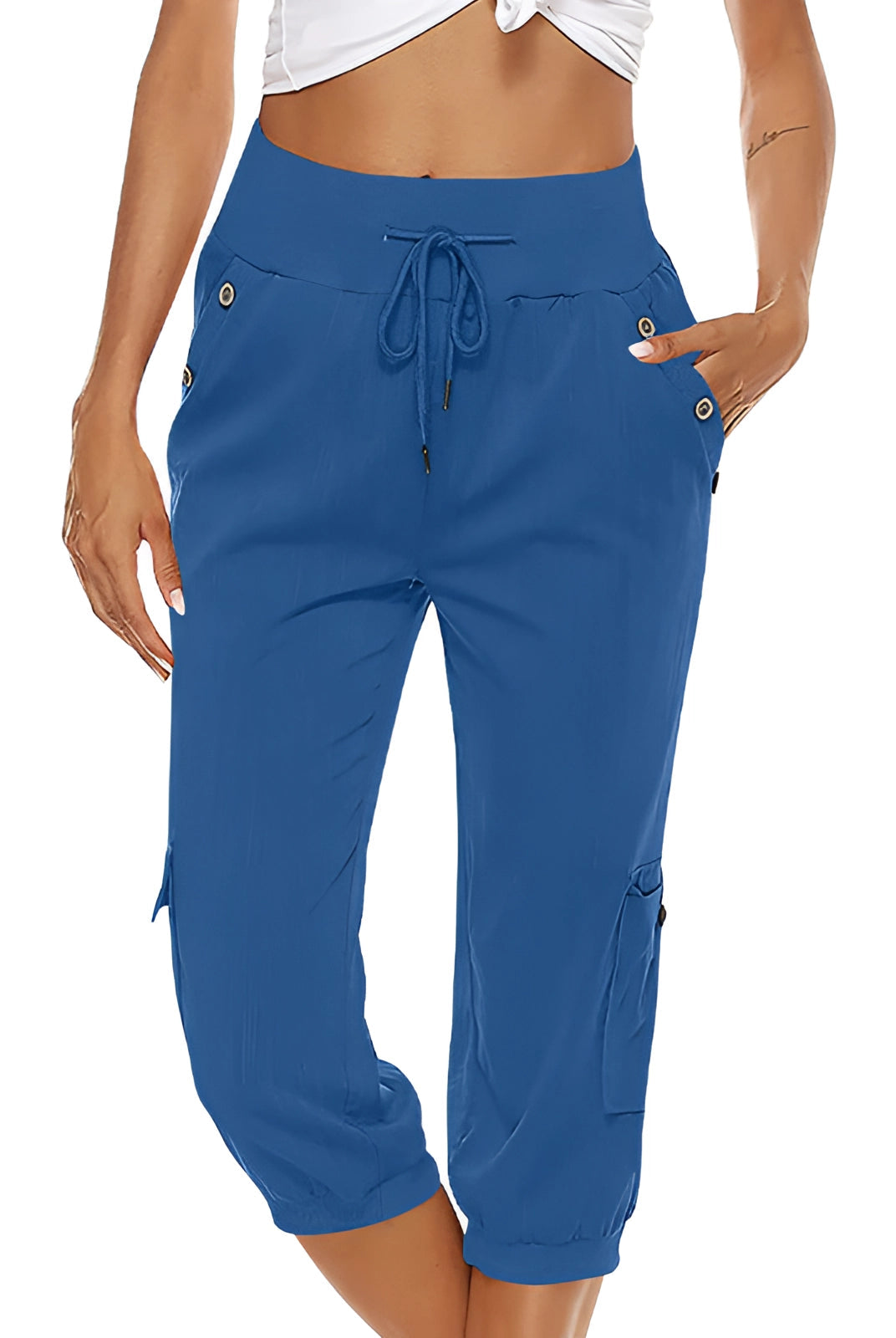 Bright green women's Capri trousers with elastic waist from Lumina Wear, featuring breathable fabric and a comfortable fit.