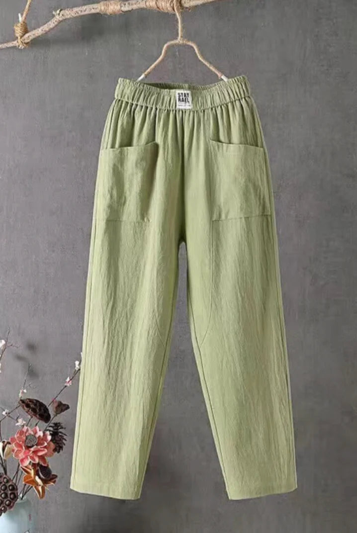 Victoria Lumina white casual trousers with elastic waistband, featuring a relaxed fit and lightweight fabric for comfortable wear.