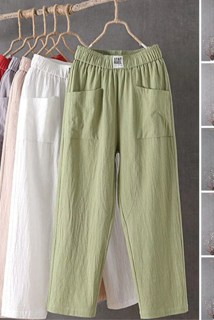 Victoria Lumina white casual trousers with elastic waistband and relaxed fit, perfect for everyday wear.