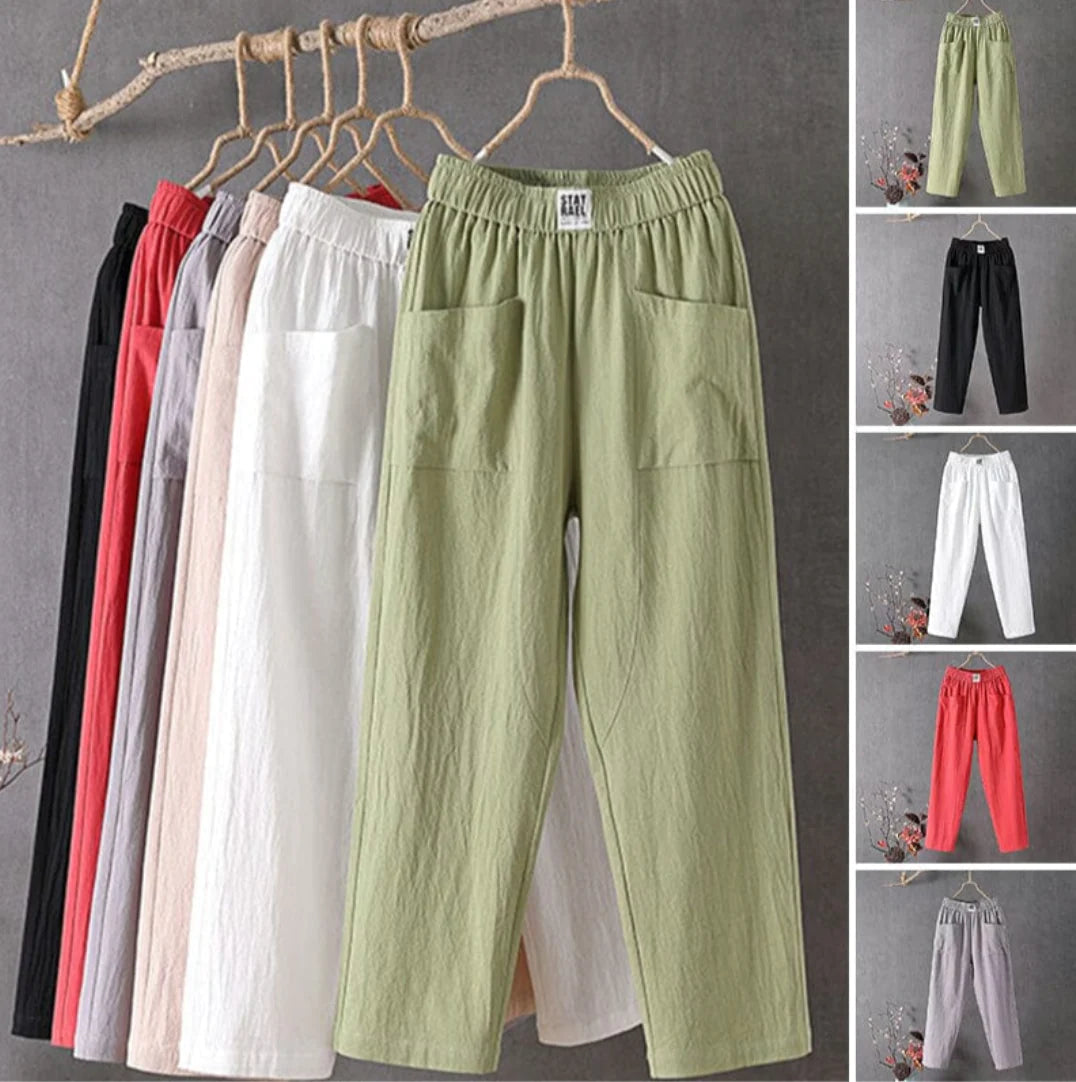 Victoria Lumina white casual trousers with elastic waistband and relaxed fit, perfect for everyday wear.