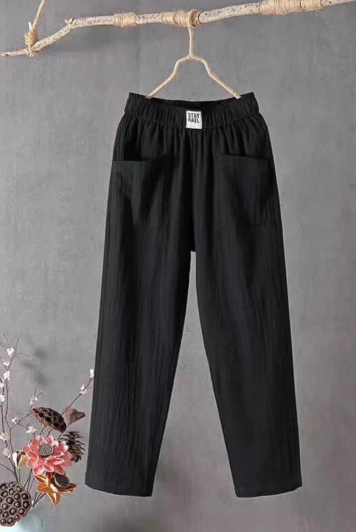 Victoria Lumina Wear casual white trousers with elastic waistband, relaxed fit, perfect for everyday comfort and style.