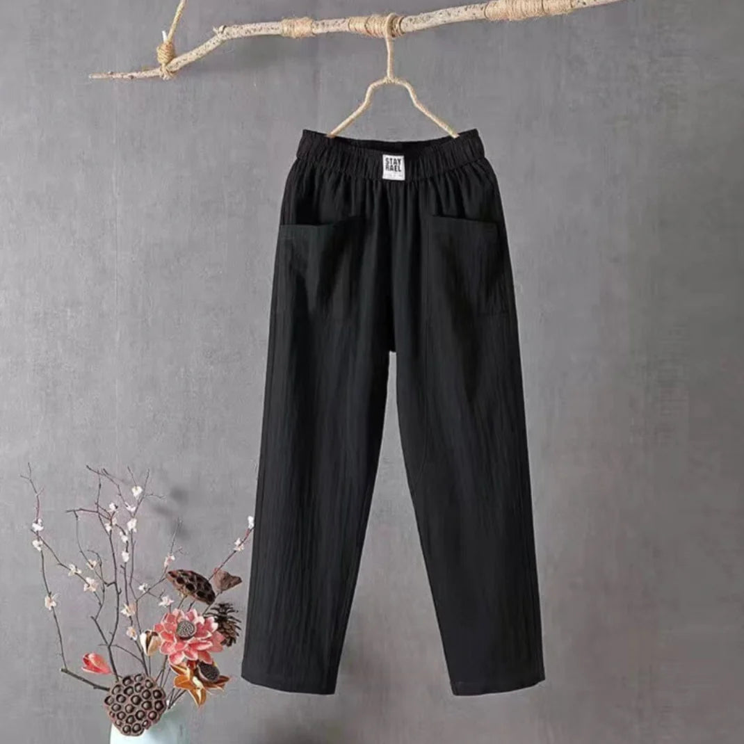 Victoria Lumina Wear casual white trousers with elastic waistband, relaxed fit, perfect for everyday comfort and style.