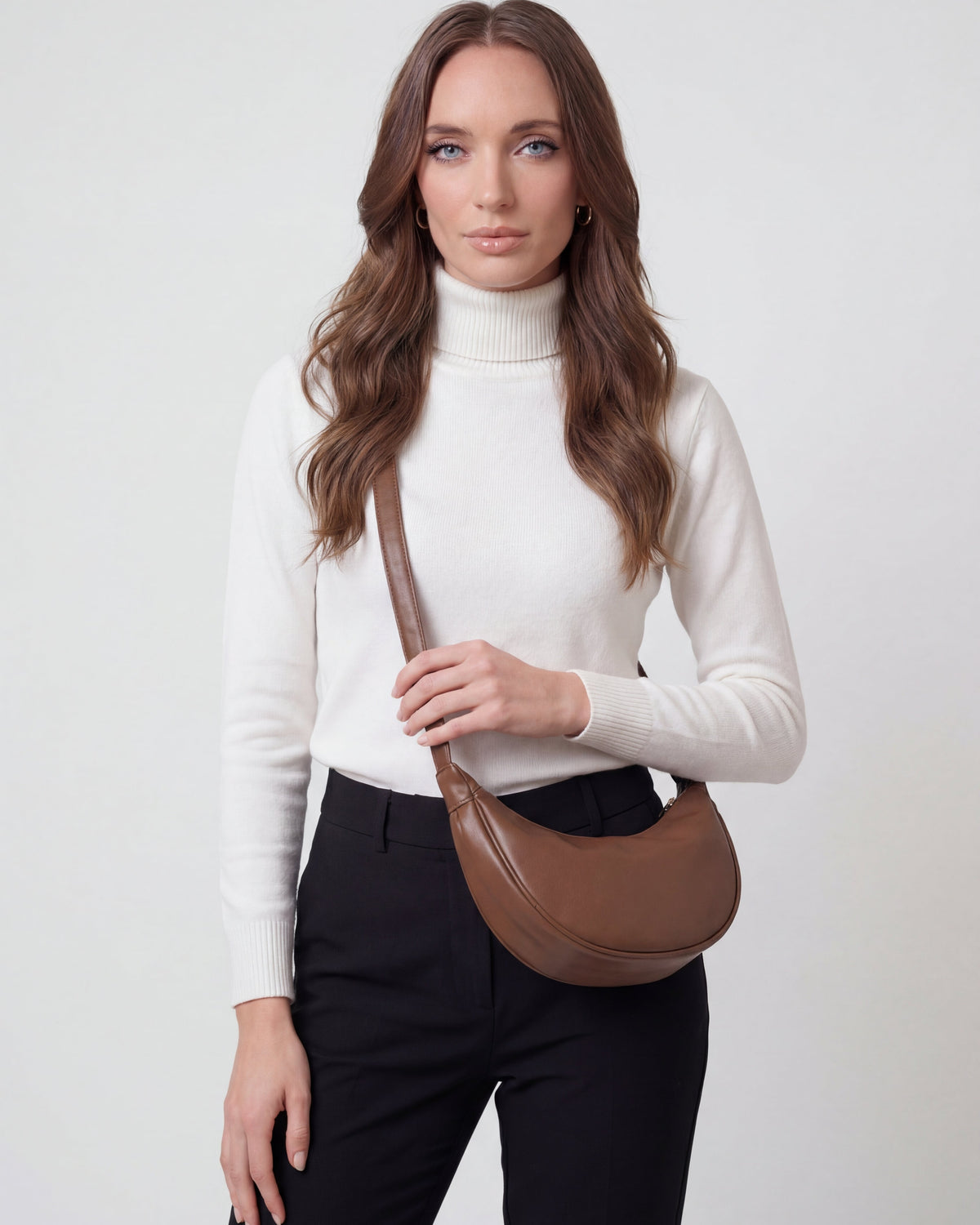 Victoria Lumina black adjustable belt handbag with multiple pockets, stylish and functional for everyday use.