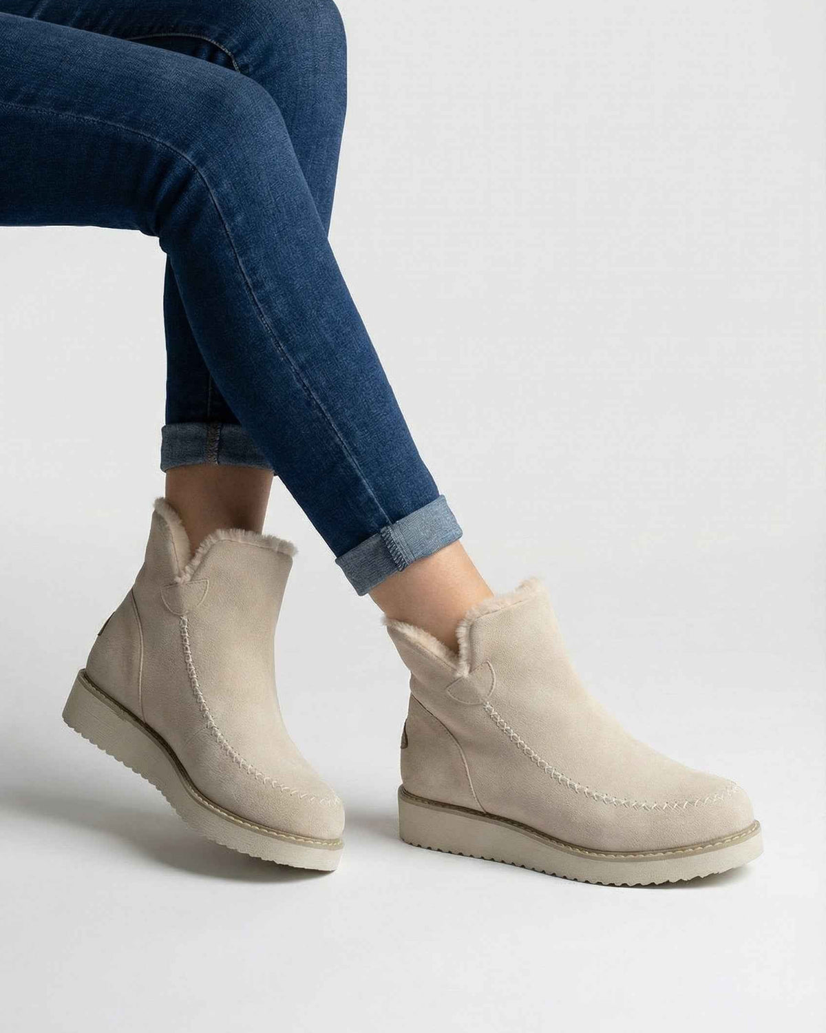 Victoria beige ankle boots by Lumina Wear featuring a chic design and durable sole, shown from a side view with laced detail.