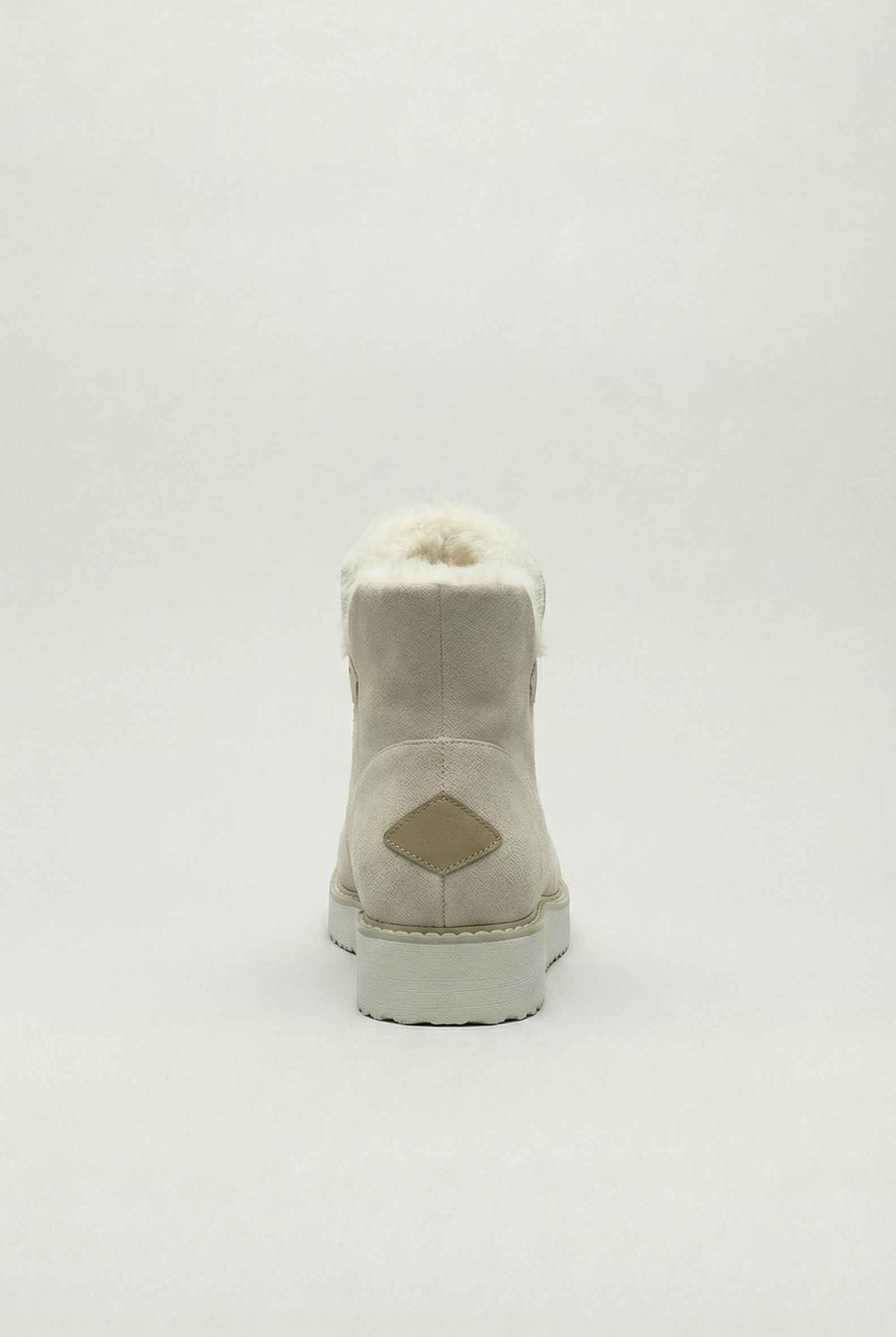 Beige Victoria ankle boots by Lumina Wear with durable sole, close-up view showing stylish design and ankle height.