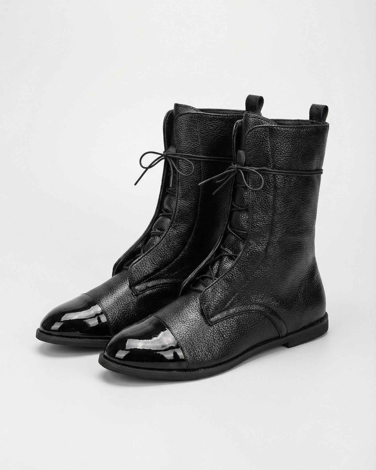 Lumina Wear Victoria black lace-up ankle boots with cozy lining, stylish footwear for women featuring a sturdy design and comfortable fit.