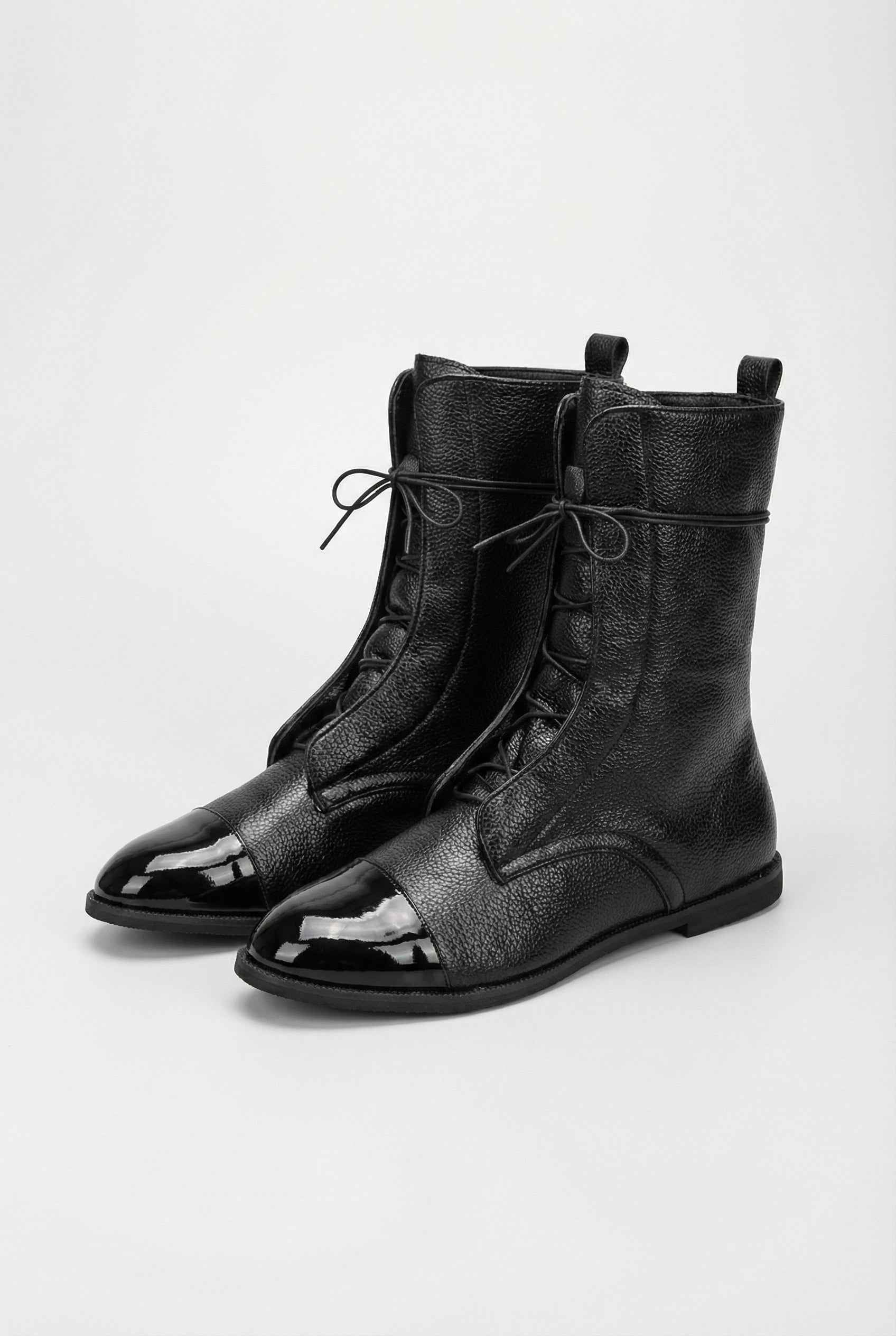 Victoria black lace-up ankle boots with cozy lining, women's Lumina Wear boots featuring stylish design and comfortable fit.