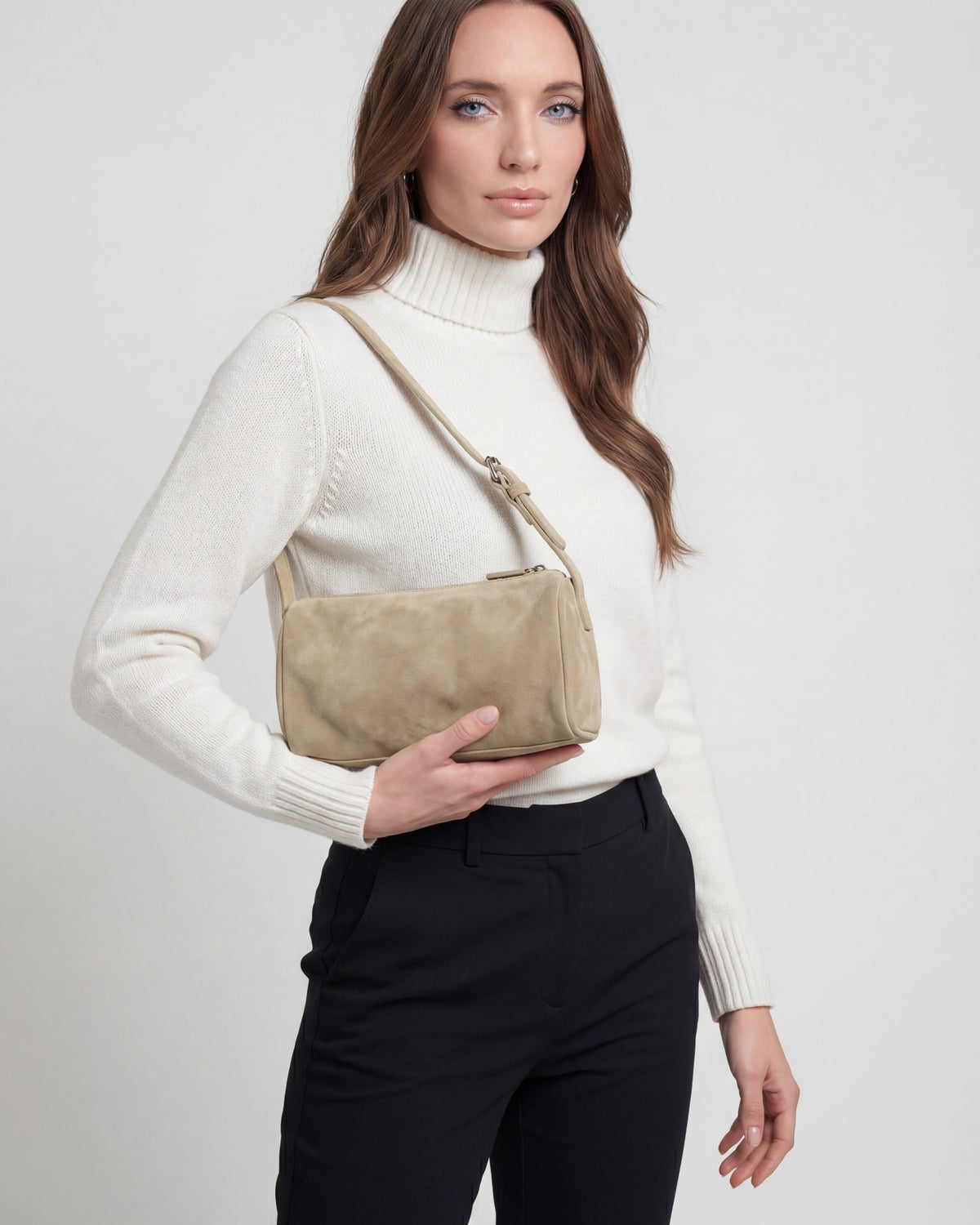Lumina Wear Victoria black mini shoulder bag with adjustable strap, stylish handbag featuring a sleek design and compact size.
