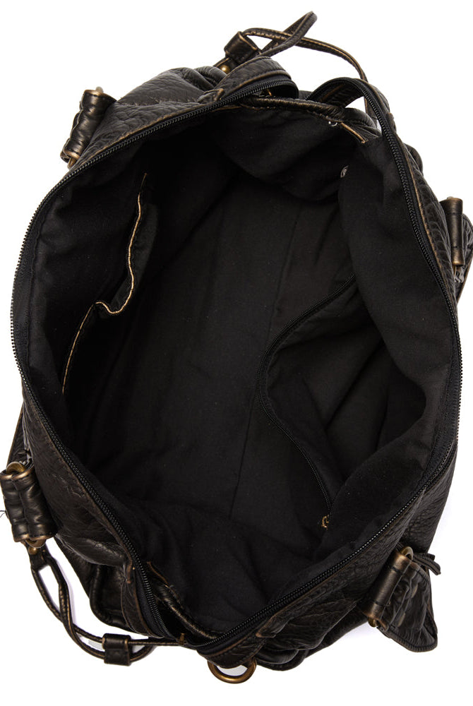 Victoria Lumina black PU leather handbag with multiple pockets, stylish design, and structured silhouette.