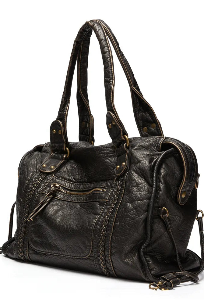 Victoria black PU leather handbag by Lumina Wear featuring multiple pockets and a chic, stylish design for versatile use.