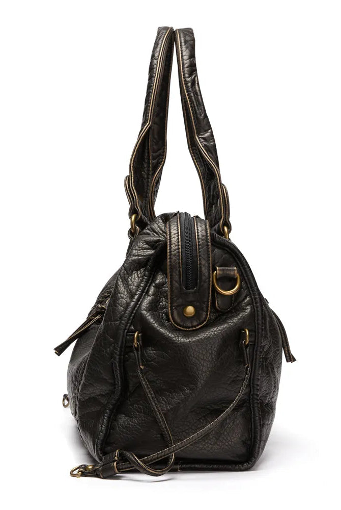 Victoria black PU leather handbag with multiple pockets, stylish design, and silver-tone hardware from Lumina Wear.